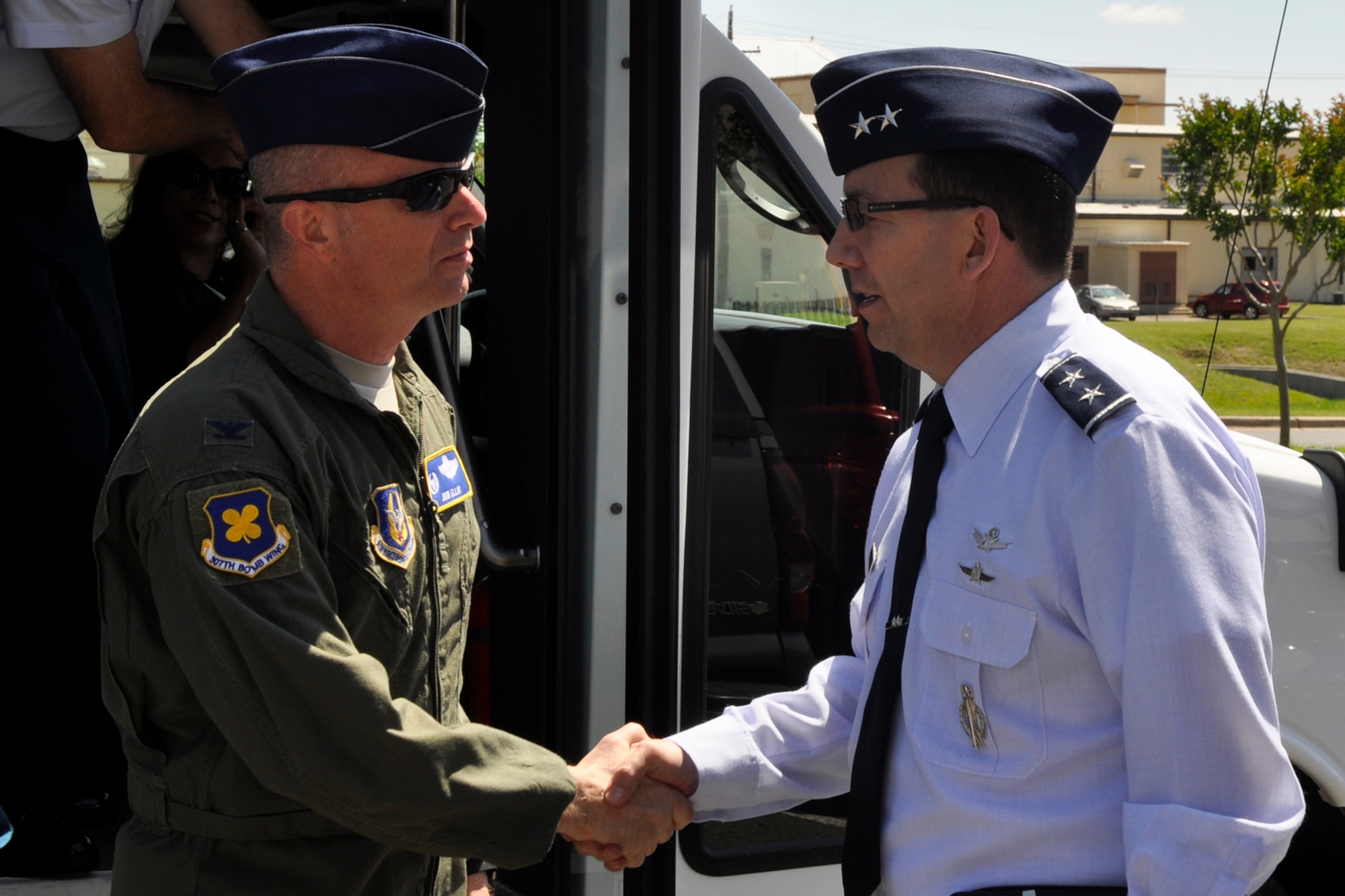 Col. Jonathan Ellis, the commander of the 307th Bomb Wing, bids a fond farewell to Maj. Gen. Robert D. Rego, the mobilization assistant to the Commander, Air Force Global Strike Command, after a brief tour of 307 BW maintenance operations at Barksdale Air Force Base., La., April 23, 2012. (U.S. Air Force photo by Master Sgt. Jeff Walston)