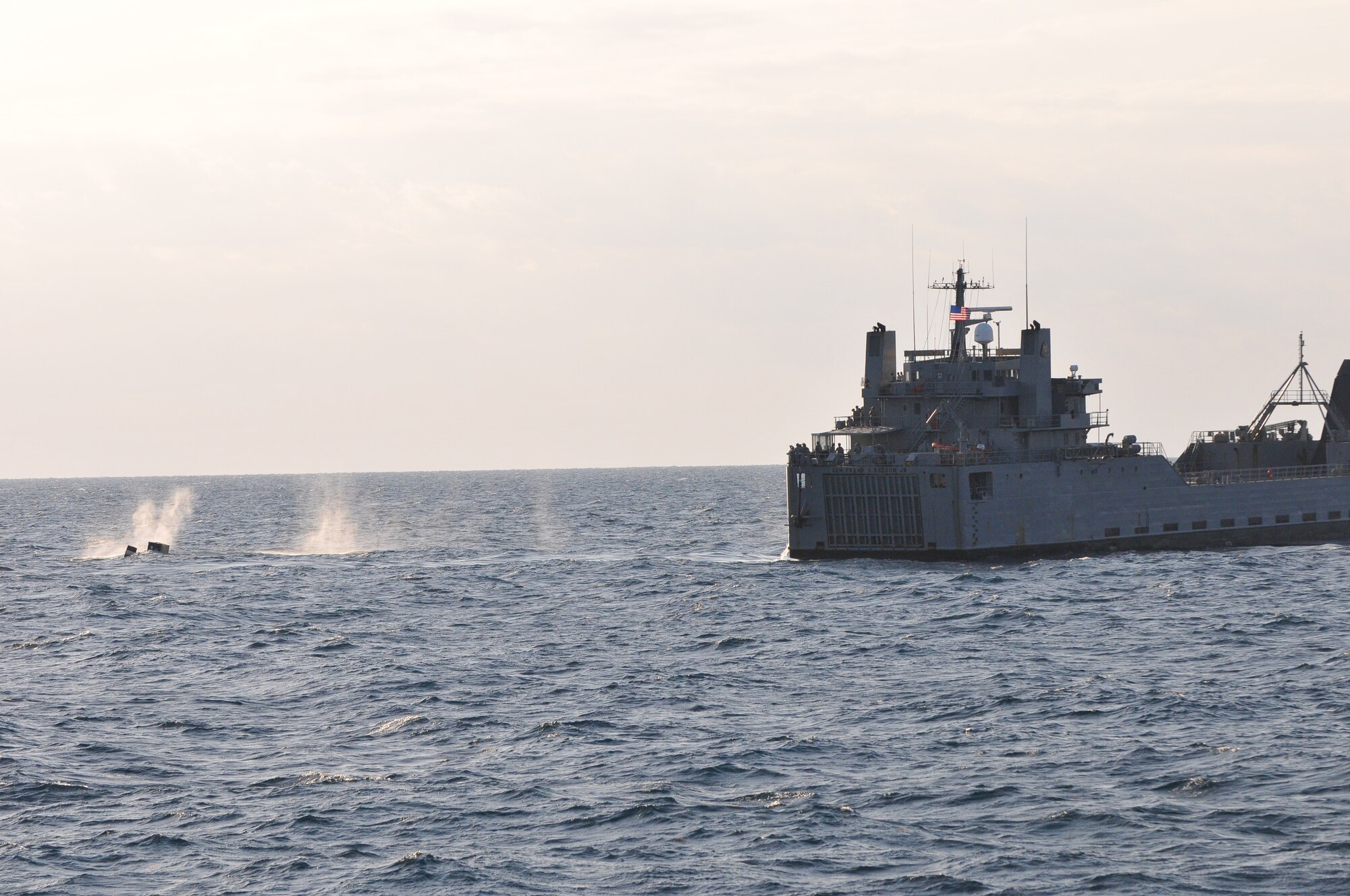 Soldiers from the 703rd Brigade Support Battalion, 4th Brigade Combat Team, 3rd Infantry Division fire the M-2 .50 caliber machine gun from the aft section of the Logistical Support Vessel 1 “Gen. Frank S. Besson Jr.” April 12, 2012. (U.S. Army photo by Staff Sgt. Alexander Burnett/Released)
