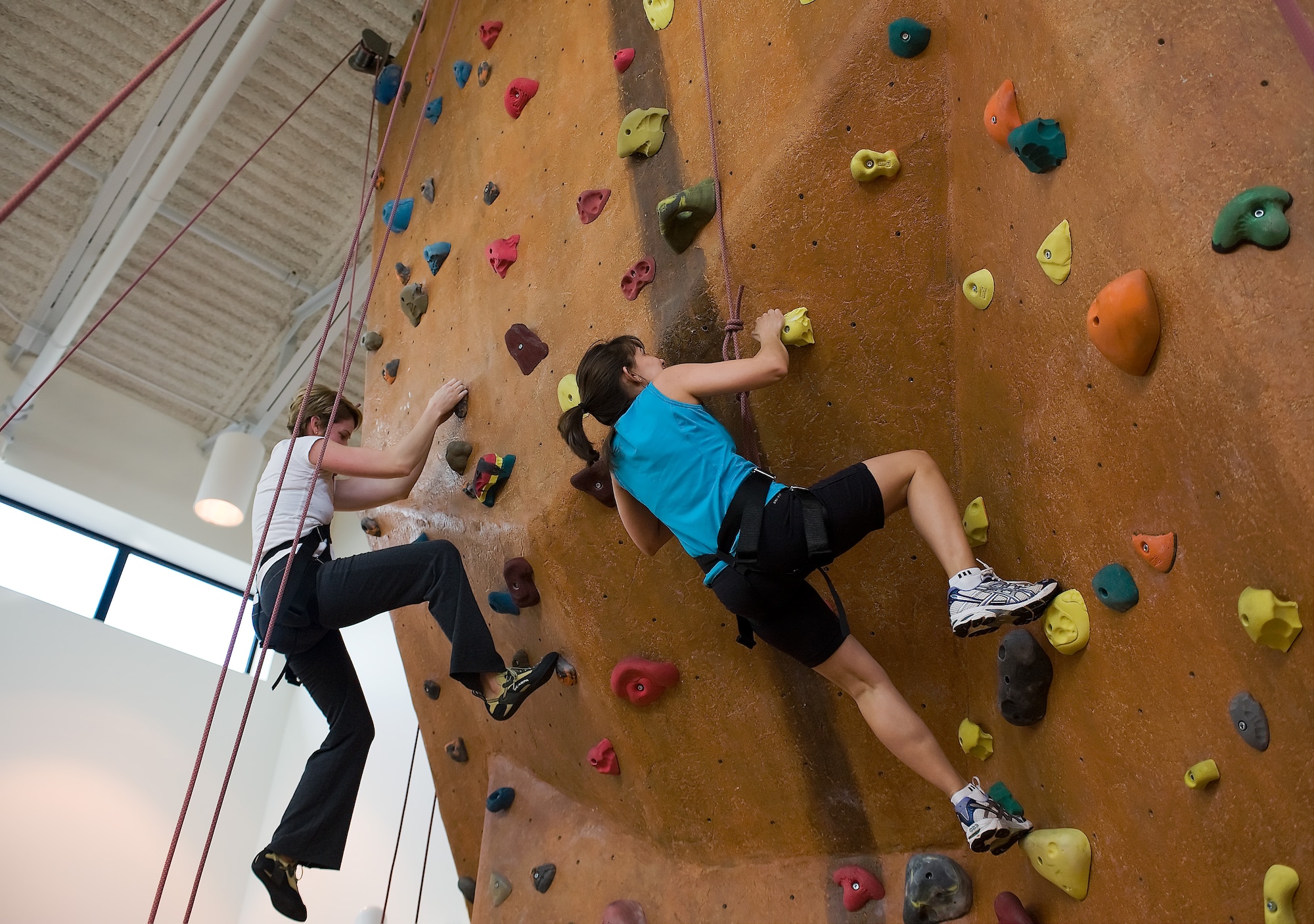 Jana Finch (left) and Kathy McNulty climb in tandem at the Dover Air Force Base, Del. Outdoor Recreation Center March 29, 2012. (U.S. Air Force photo/Steve Kotecki)
