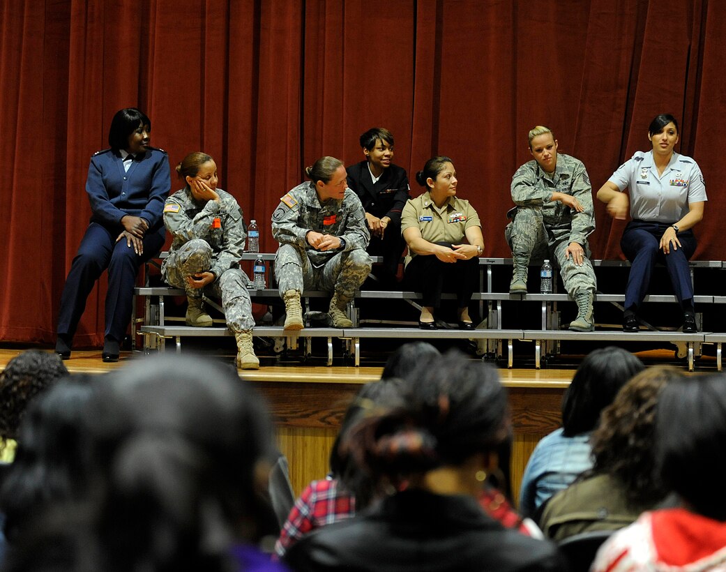 Service women speak to group of female Air Force Junior Reserve Officer Training Corps cadets during the Women in the Military Forum at Hampton High School, Hampton, Va., April 23, 2012. More than 40 AFJROTC female cadets attended the forum and learned about military living, deployments and different career fields in the Air Force, Army and Navy. (U.S. Air Force photo by Staff Sgt. Dana Hill/Released)