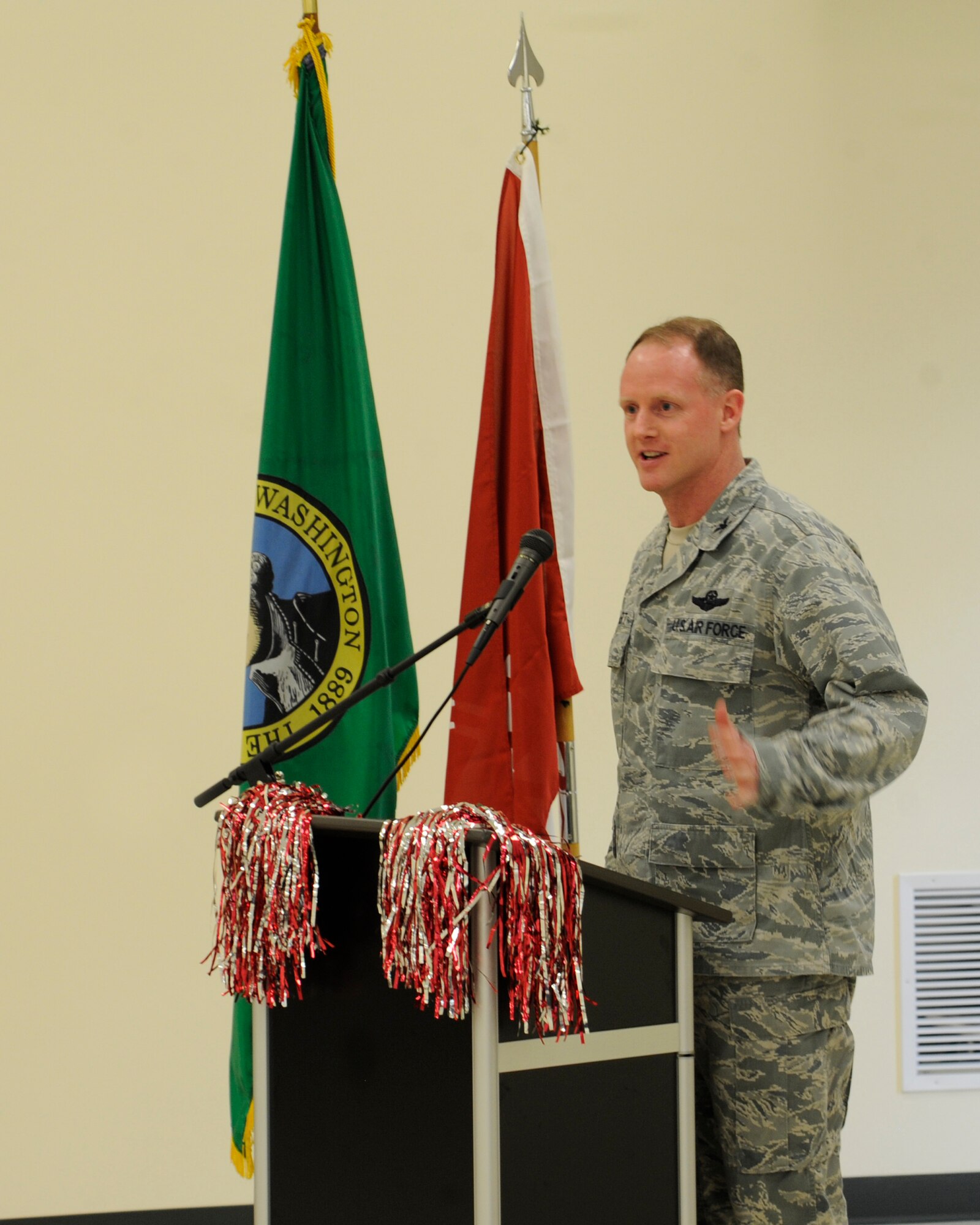 Col. Marc Van Wert, 92nd Air Refueling Wing vice commander, speaks with Team Fairchild members during the “Cougar Salute to Our Armed Forces” barbeque in the Armed Forces Reserve Center at Fairchild Air Force Base, Wash., April 18, 2012. Van Wert emphasized the important relationship Air Force bases have with their host communities. (U.S. Air Force photo by Airman 1st Class Ryan Zeski/Released)
