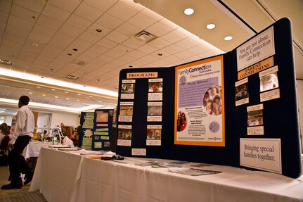 Military members and their families attend the School Choice Showcase at the Club at Joint Base Charleston on April 23. The showcase provided information to JB Charleston families about the educational choices available for their children in the Charleston County area. The event featured musical performances from local school children and informational displays from local schools. (U.S. Air Force photo by Airman 1st Class George Goslin/Released)

