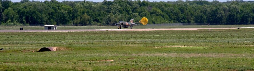 An F-4 Phantom lands on the base flightline during the 2012 Barksdale Air Force Base Defenders of Liberty Air Show April 22. The Phantom was the first multi-service aircraft, and was flown concurrently by the U.S. Navy, Air Force and Marine Corps. The F-4 was the only aircraft ever flown at the same time by the Air Force and Navy flight demonstration teams, the Thunderbirds and the Blue Angels. (U.S. Air Force photo/Senior Airman La'Shanette V. Garrett) (RELEASED)
