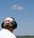 A spectator watches as a P-47 Thunderbolt and F-4 Phantom fly together in a Heritage Flight performance during the 2012 Barksdale Air Force Base Defenders of Liberty Air Show April 22. Nicknamed 'Jug,' the P-47 flew its first flight on May 6, 1947 whereas the F-4 made its first flight in May 1958. (U.S. Air Force photo/Senior Airman La'Shanette V. Garrett) (RELEASED)