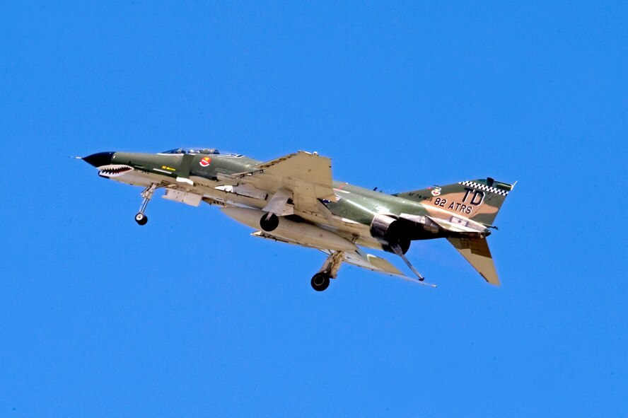 An F-4 Phantom flies over the crowd during the 2012 Barksdale Air Force Base Defenders of Liberty Air Show April 22. The Phantom was the first multi-service aircraft, and was flown concurrently by the U.S. Navy, Air Force and Marine Corps. The F-4 was the only aircraft ever flown at the same time by the Air Force and Navy flight demonstration teams, the Thunderbirds and the Blue Angels. (U.S. Air Force photo/Senior Airman La'Shanette V. Garrett) (RELEASED)

