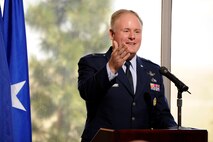 Brig. Gen. Roger W. Teague, Space and Missile Systems Center vice commander. speaks to members of the 4th Space Operations Squadron and other attendees at the ceremony marking the 20th Anniversary of the 4 SOPS April 20. Following the ceremony, attendees were able to tour the current 4 SOPS operations floor. (U.S. Air Force Photo/Dennis Rogers)