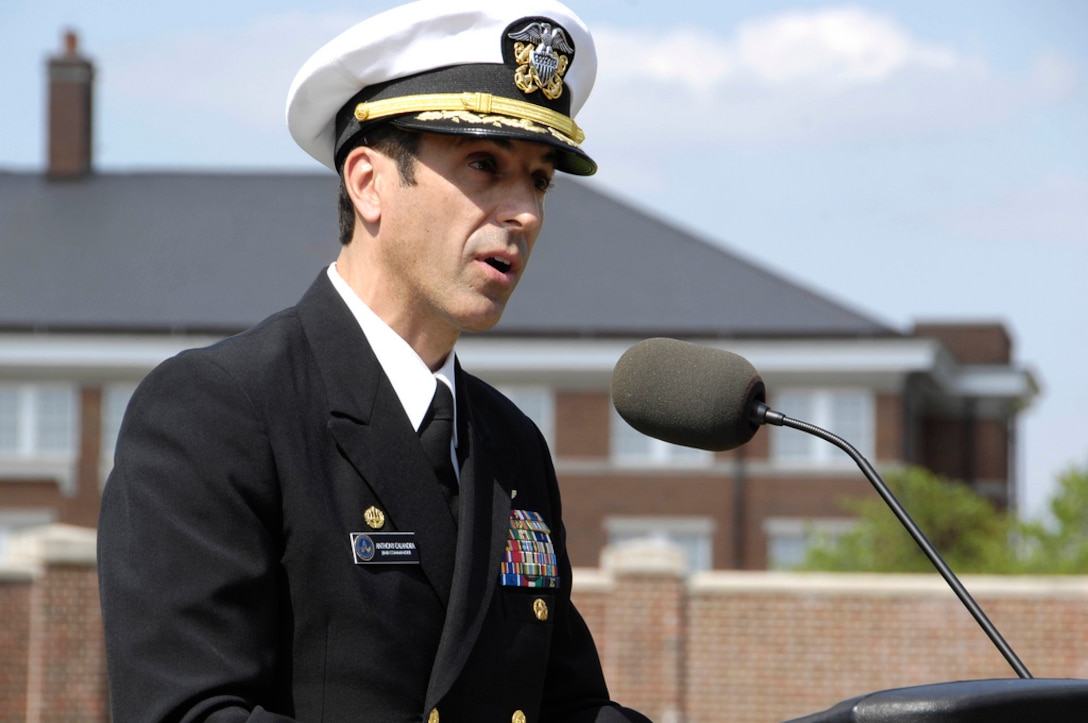 Navy Capt. Anthony T. Calandra, Joint Base Anacostia-Bolling commander, speaks to the audience during a remembrance ceremony. Joint Base Anacostia-Bolling honored those who lost their lives during a Holocaust: Days of Remembrance ceremony at the U.S. Air Force Ceremonial Lawn, April 19, on base. (U.S. Air Force photo by Senior Airman Steele C. G. Britton)
