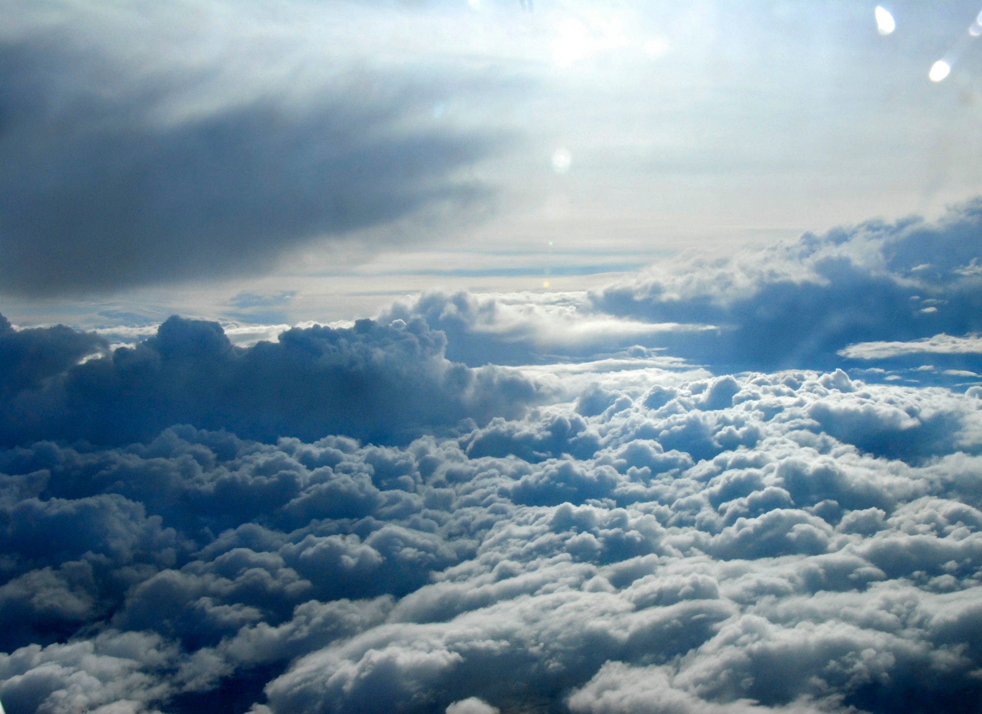 A "heavenly" view of the clouds over Kyrgyzstan, is a perfect scene for an "angel flight" April 19, 2012, comprised of an all-female crew deployed to the Transit Center at Manas who had the opportunity to fly an in-flight refueling mission together, transferring a total of 18,000 pounds  of fuel to F-16 Fighting Falcons. (U.S. Air Force photo/Senior Airman Lynsie Nichols)
