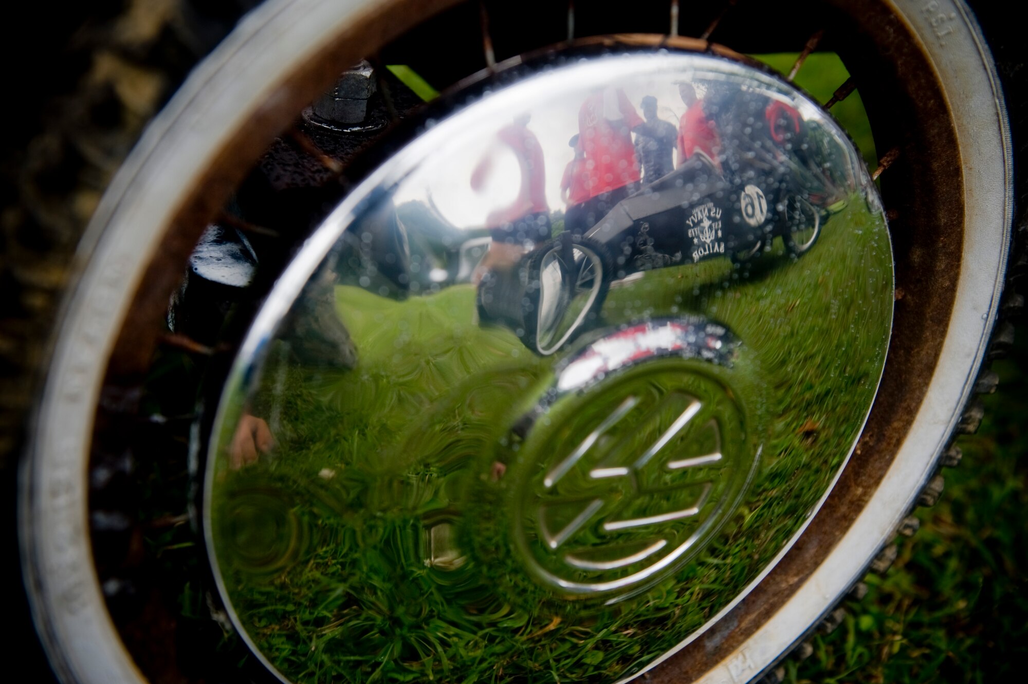Derby cars sit in the rain preparing to go down the track at the Red Cross Derby Day at Kadena Air Base, Japan, April 24, 2012. The derby raised $5,200 for community service projects on Okinawa. (U.S. Air Force photo by Staff Sgt. Jonathan Steffen/ Released)