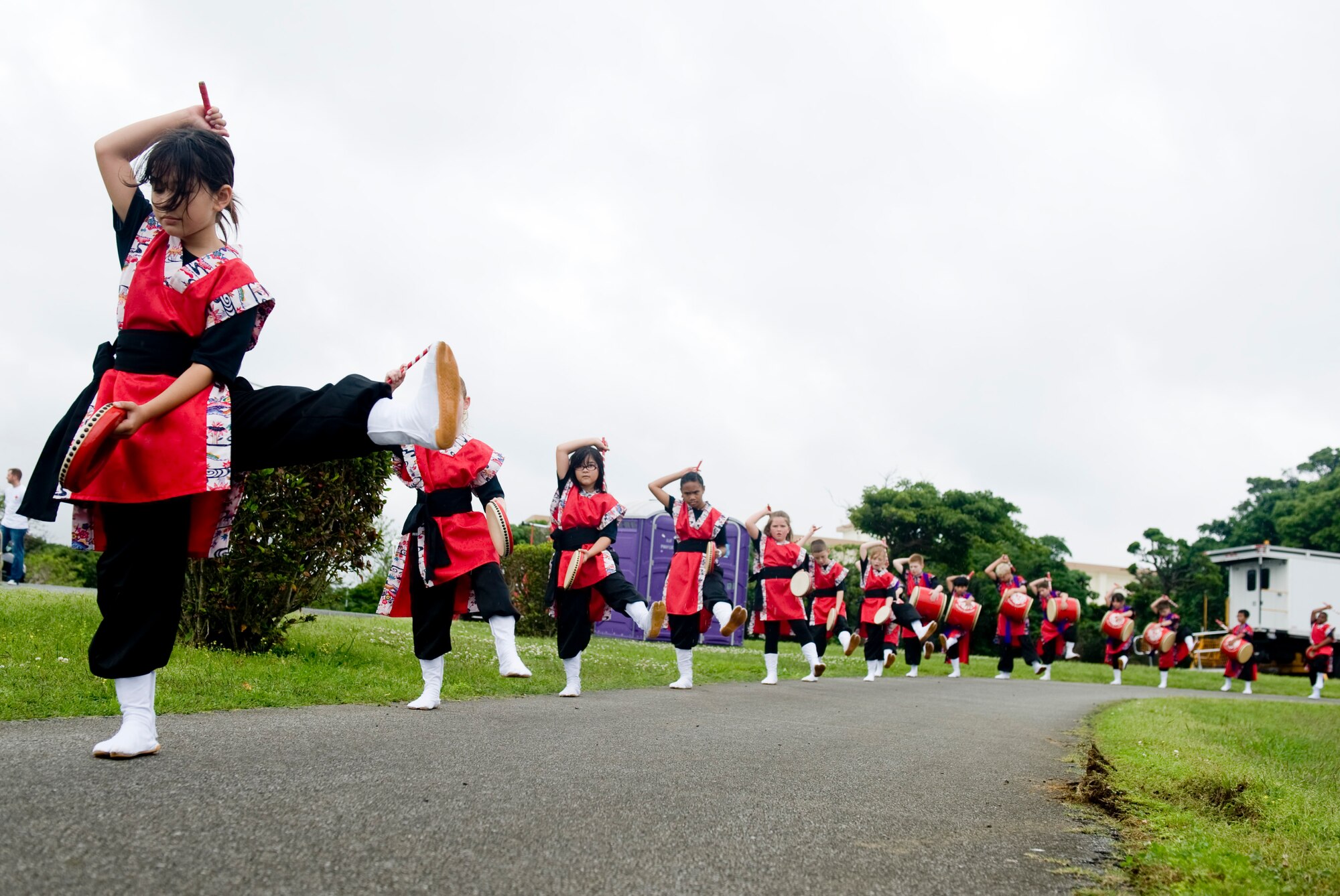 Amelia Earhart Fire Drummers perform traditional Okinawa Eisa drumming during Red Cross Derby Day at Kadena Air Base, Japan, April 24, 2012. The derby raised $5,200 for community service projects for U.S. service members and their families on-island. (U.S. Air Force photo by Staff Sgt. Jonathan Steffen/Released)