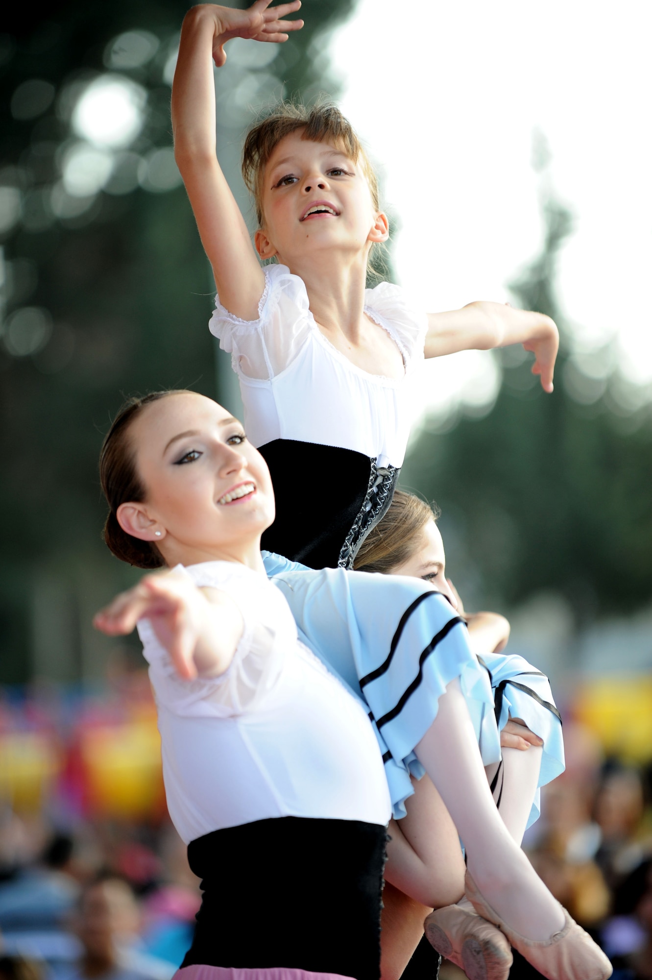 Members of the Incirlik Youth Center perform ballet during a Children's Day festival April 22, 2012, at Incirlik Air Base, Turkey. The event was hosted by the Turkish air force 10th Tanker Base Command and was open to all Turkish and American members of Team Incirlik. The event offered an opportunity for camaraderie and building partnership between Turkish and American service members and civilians. Children's Day is a national holiday that honors Turkish children and the future of the country. (U.S. Air Force photo by Senior Airman Jarvie Z. Wallace/Released) 