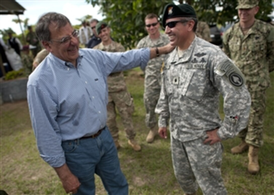 Secretary of Defense Leon E. Panetta greets U.S. service members in Tolemaida, Colombia, April 23, 2012. Panetta is on a five-day trip to the region to meet with counterparts and military officials in Brazil, Colombia and Chile to discuss an expansion of defense and security cooperation.  