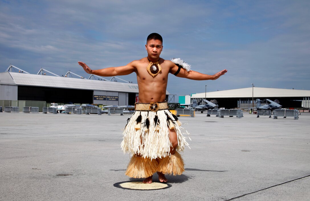 Sgt. Nathaniel Duarosan, the mission assurance noncommissioned officer in charge for Marine Corps Air Station Cherry Point, rehearses a Tahitian dance routine on the air station’s flightline Apr. 25, 2012, in preparation for his performance in the multicultural heritage portion of the 2012 MCAS Cherry Point Air Show. MCAS Cherry Point will "Celebrate the Heritage" May 4-6 by commemorating 100 years of Marine Corps aviation, the 70th anniversary of the air station and multicultural diversity.