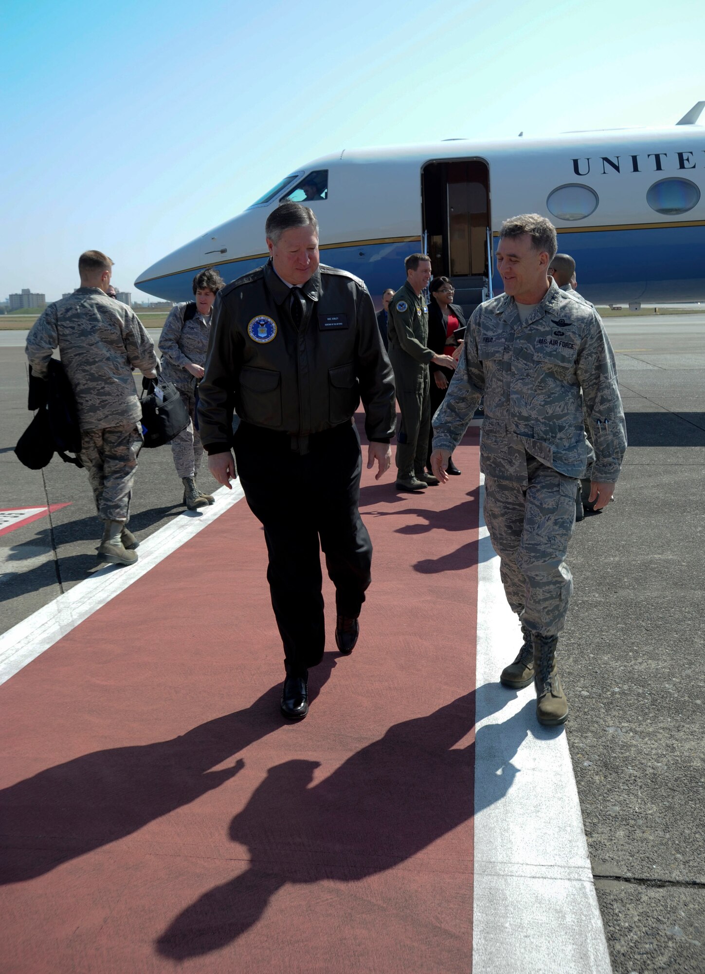 Lt. Gen. Burton Field, U.S. Forces, Japan, and 5th Air Force commander, greets Secretary of the Air Force Michael Donley at Yokota Air Base, Japan, April 24, 2012. Donley visited Yokota during a trip through the western Pacific region to meet with Airmen and thank them for their service. (U.S. Air Force photo/Staff Sgt Stacy Moless)