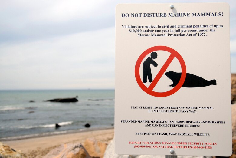 VANDENBERG AIR FORCE BASE, Calif. -- A sign posted at Vandenberg beaches reminds Team V members not to disturb beached marine mammals here Tuesday April 24, 2012.  Individuals are to stay at least 100 yards from any marine mammal.  (U.S. Air Force photo/Jennifer Green-Lanchoney)