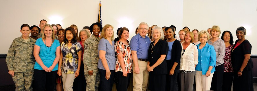Administrative professionals pose for a photo at the Barksdale Club on Barksdale Air Force Base, La., April 25. The 2nd Bomb Wing held a luncheon in their honor. This unofficial holiday recognizes all secretaries, receptionists and administrative support professionals. (U.S. Air Force photo/Airman 1st Class Benjamin Gonsier)(RELEASED)