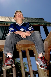 A young boy plays at Eagle Harbor Ranch in Summerville April 12. Eagle Harbor Ranch is a place of refuge and shelter for children ages six to 21 who are orphaned, neglected, abused or abandoned. Airman from the 437th Maintenance Squadron Ammo Flight volunteer at Eagle Harbor Ranch at least four times a year.  (U.S. Air Force photo/Airman 1st Class Chacarra Walker)