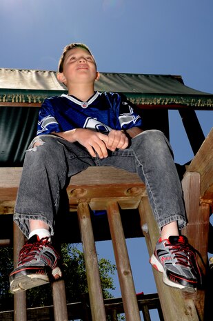 A young boy plays at Eagle Harbor Ranch in Summerville April 12. Eagle Harbor Ranch is a place of refuge and shelter for children ages six to 21 who are orphaned, neglected, abused or abandoned. Airman from the 437th Maintenance Squadron Ammo Flight volunteer at Eagle Harbor Ranch at least four times a year.  (U.S. Air Force photo/Airman 1st Class Chacarra Walker)