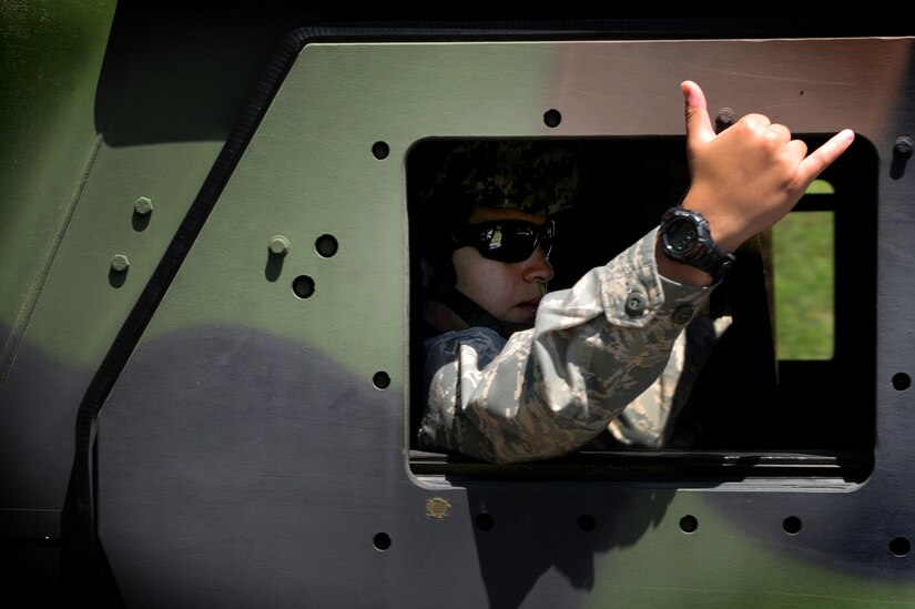 Airman 1st Class Ronni Aragona rides in a  High-Mobility Multipurpose Wheeled Vehicle during tactical vehicle training at Joint Base Charleston - Air Base, April 24. The monthly training is given to members of the 628th Security Forces Squadron to familiarize them with operating tactical vehicles and how to perform security checks while in a convoy.  Aragona is a 628th SFS journeyman.    (U.S. Air Force photo/ Staff Sgt. Nicole Mickle)   