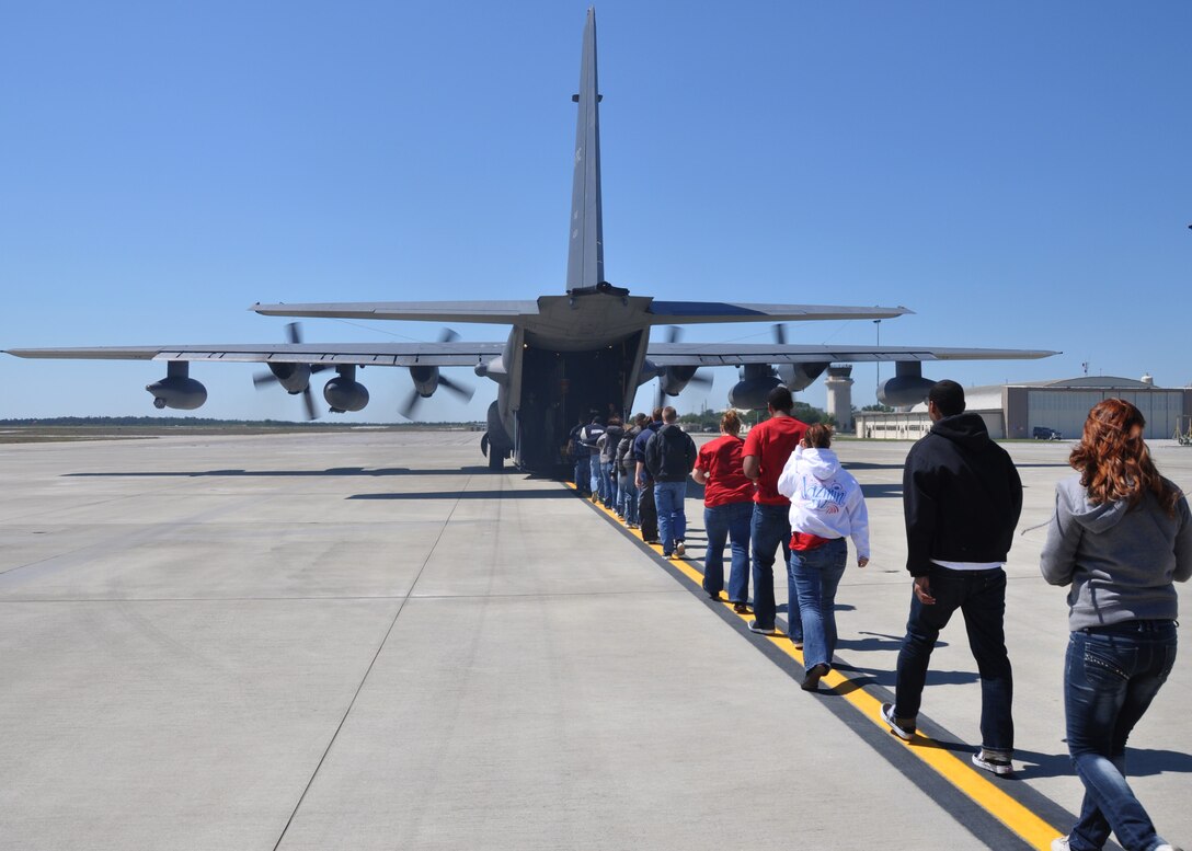 A group of Air Force Junior ROTC cadets keeps a tight line as they board a 919th Special Operations Wing MC-130E Combat Talon I at Duke Field, Fla., April 24. The wing invited senior cadets from five local area high schools to tour the base and receive a flight to help them explore Air Force careers through direct interaction with Duke Field’s Citizen Commandos. (U.S. Air Force photo/Tech. Sgt. Jasmin Taylor)
