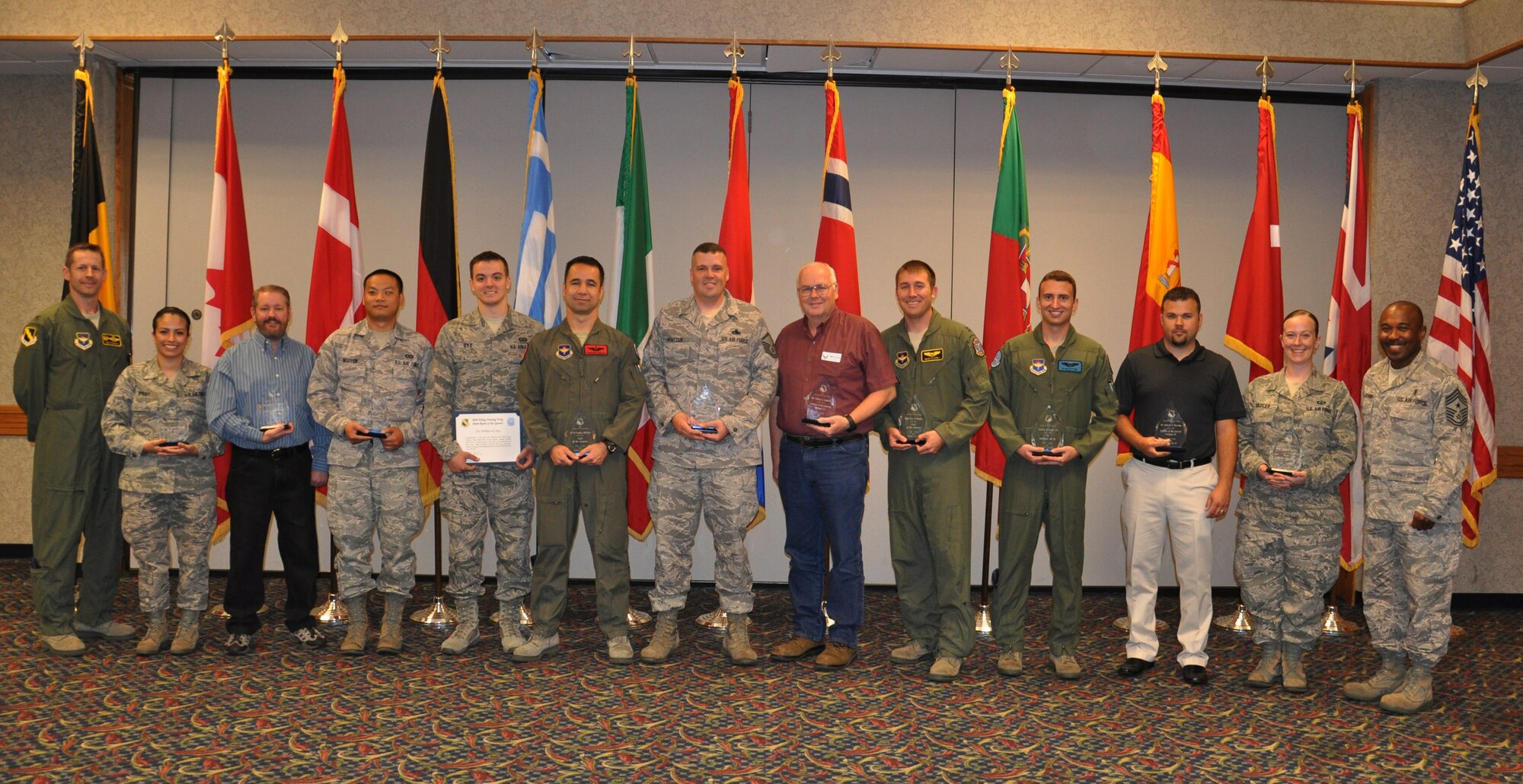 The 80th Flying Training Wing recognizes its Quarterly Award winners April 25, 2012 with a luncheon at the Sheppard Club. (U.S. Air Force photo/2nd Lieutenant Sara Harper) 
