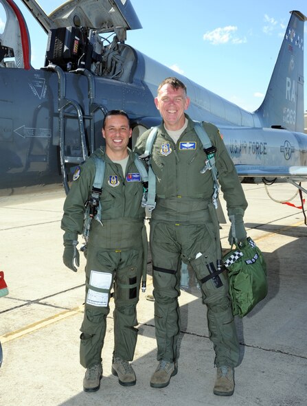 RANDOLPH AIR FORCE BASE, Texas -- 22nd Air Force Commander Maj. Gen. Wallace W. Farris receives a T-6 orientation flight with Maj. Jason Cashman of the 39th Flying Training Squadron. Farris visited the 340th Flying Training Group March 21-22, 2012.  The 340th FTG is the Air Force Reserve's only pilot instructor training group and works in a classic association with Air Education and Training Command. Farris visited the group and talked with its members regarding the group's long-term successful integration with AETC.