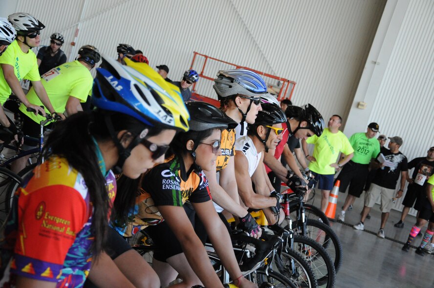 Competitors in the eighth annual Adventure Race form up at the starting line April 21, 2012 at Laughlin’s Weather Hanger. This year’s Adventure Race consisted of 23.3 miles of biking, a 5.3 mile run and a 1,200 meter three person rafting race. (U.S. Air Force photo/Senior Airman Scott Saldukas)