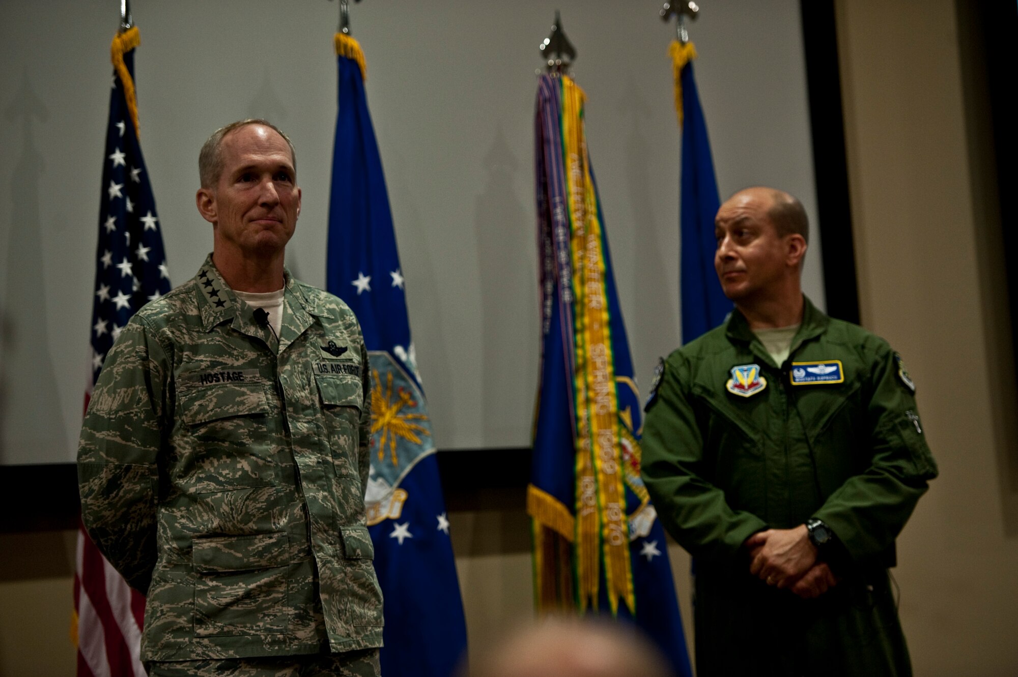 Gen. Michael Hostage, commander of Air Combat Command, and Col. Mustafa Koprucu, commander of the 505th Command and Control Wing, address Airmen during an all-call at the 505th CCW at, Hurlburt Field, Fla., April 24, 2012. As the ACC commander, the general is responsible for organizing, training, equipping and maintaining combat-ready forces for rapid deployment. (U.S. Air Force photo/Airman 1st Class Hayden K. Hyatt)