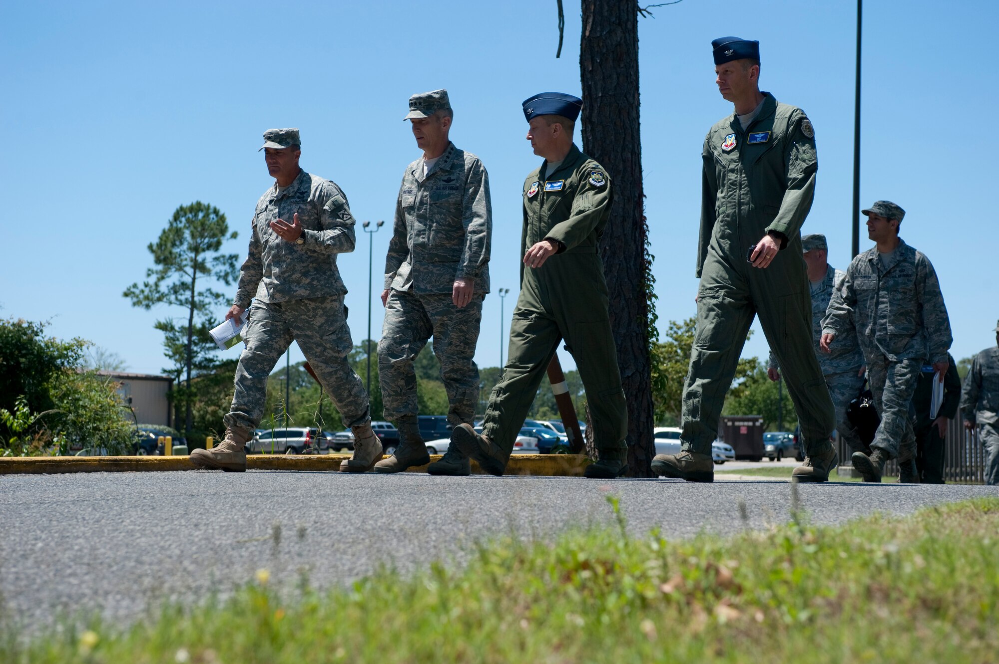 Gen. Michael Hostage, commander of Air Combat Command, center left, participates in a walking tour with Col. Mustafa Koprucu, commander of the 505th Command and Control Wing at Hurlburt Field, Fla., April 24, 2012. The 505th CCW is headquartered at Hurlburt Field, Fla., but has several geographically separated units across the United States. (U.S. Air Force photo/Airman 1st Class Hayden K. Hyatt) 
