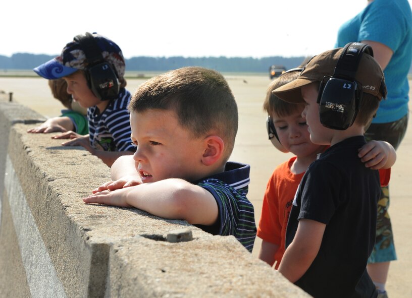 Aaron Nivens, student in First Presbyterian Preschool class, waits to watch an F-16 Fighting Falcon perform during a tour of the flight line and the 77th Fighter Squadron at Shaw Air Force Base, S.C., March 30, 2012. The month of April is the Month of the Military Child. During this month, numerous events are held for children to recognize the sacrifices of children in military families. (U.S. Air Force photo by Senior Airman Tabatha McCarthy/released)