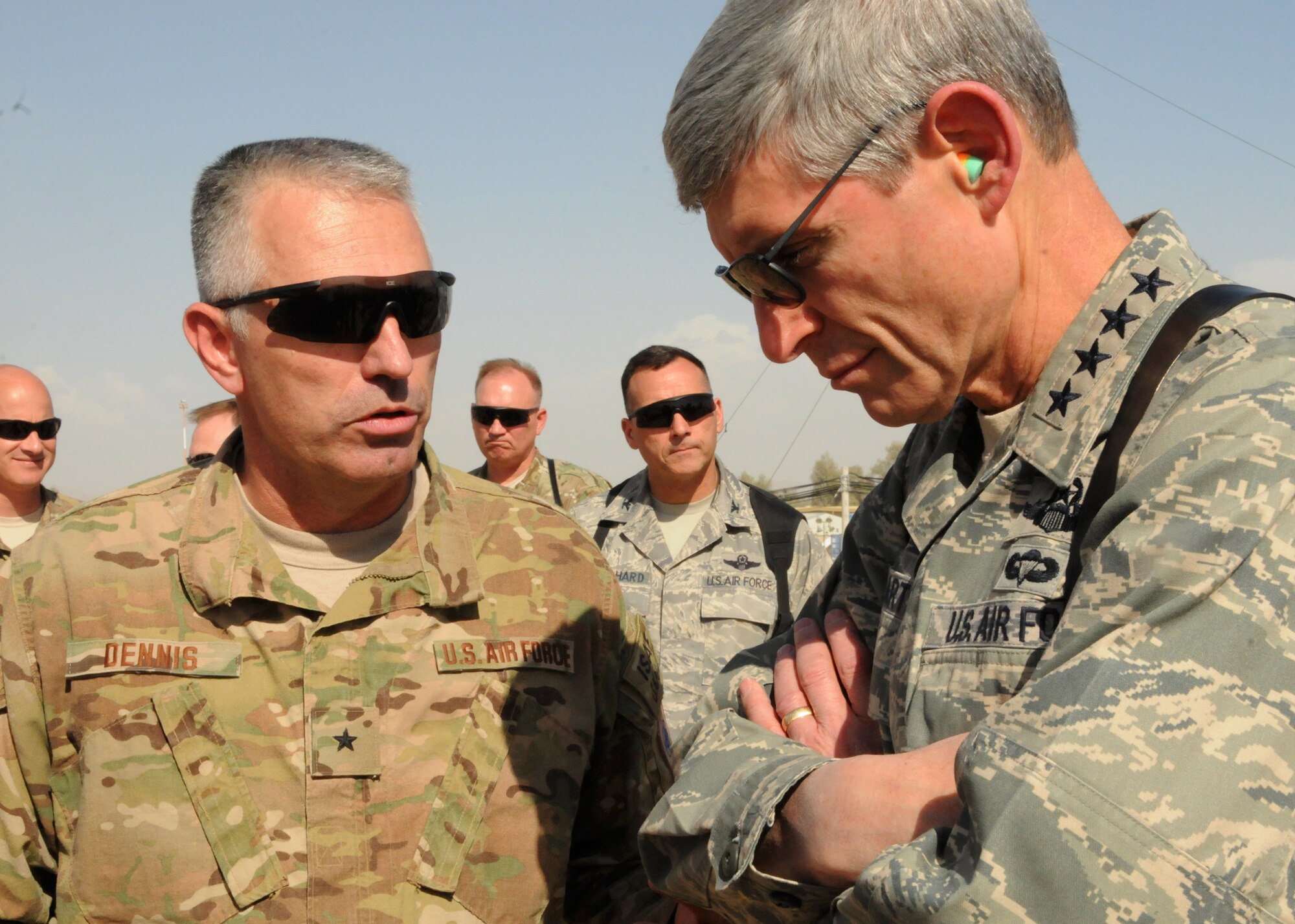 Brig. Gen. Scott Dennis, Kandahar Airfield and 451st Air Expeditionary Wing commander, briefs Air Force Chief of Staff Gen. Norton Schwartz about the wing’s mission at Kandahar Airfield, Afghanistan, April 24, 2012. Dennis accompanied Schwartz as he toured the airfield.  (U.S. Air Force photo/Staff Sgt. Heather Skinkle)