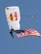 A Red Bull jumper parachutes to the ground carrying the American flag as the national anthem plays during the 2012 Barksdale Air Force Base Defenders of Liberty Air Show April 22. The annual base air show provides the 2nd Bomb Wing an opportunity to showcase the Air Force mission and to say thanks to the Shreveport-Bossier Community for generously supporting Barksdale Air Force Base. (U.S. Air Force photo/Senior Airman La'Shanette V. Garrett)(RELEASED)
