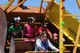 Children enjoy a ride on the Pirate's Revenge Swing during the 2012 Barksdale Air Force Base Defenders of Liberty Air Show April 22. This free and open to the public two-day annual event included several aerial demonstration acts, headlined by the U.S. Air Force Thunderbirds. Attendees also had the opportunity to view up-close static displays of aircraft and enjoy many vendors from the local community. (U.S. Air Force photo/Senior Airman La'Shanette V. Garrett)(RELEASED)
