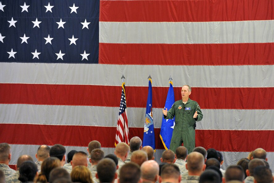 U.S. Air Force Gen. Mike Hostage, commander of Air Combat Command, addresses approximately 500 Airmen during an "all call" at Hill Air Force Base, Utah, April 20. The trip included updates on the base's missions.  Hill also hosted ACC's commander's group, providing 20 civic leaders from across the nation with an opportunity to see how the installation enables the Air Force's combat capability. (U.S. Air Force photo by Alex Lloyd/Released)