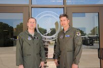 Second Lt. Davy Braxton (left) and his commander, Lt. Col. Bryan Runkle, stand outside the squadron headquarters April 17 at Joint Base San Antonio-Randolph. (U.S. Air Force photo/Rich McFadden) 