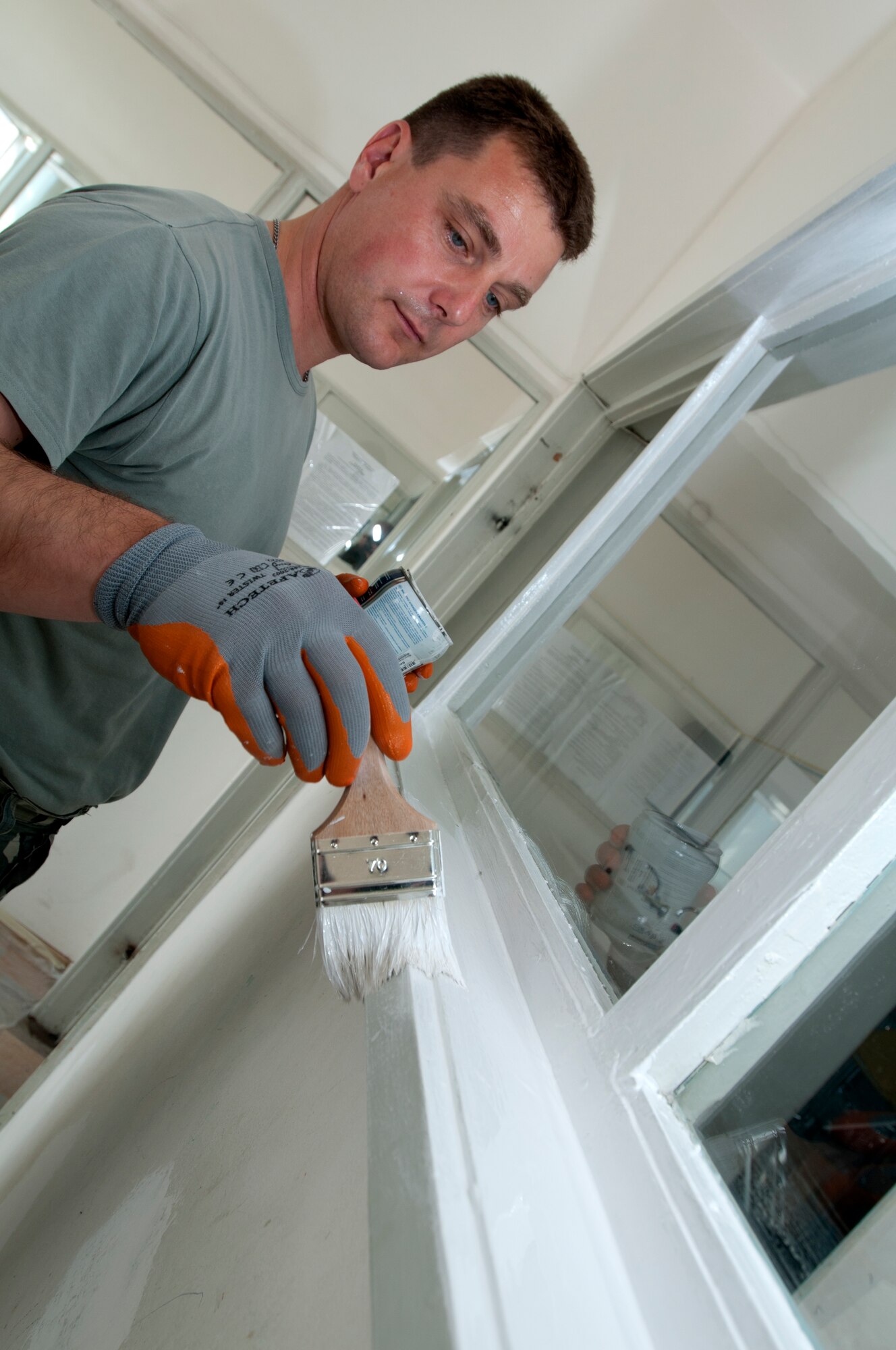 Bulgarian Sgt. Ivan Chernav paints a post-operation room in St. George's University pediatric surgery department April 21, 2012, in Plovdiv, Bulgaria. The hospital has one of only two pediatric surgery departments in the country. U.S. Air Force members deployed from the 31st Fighter Wing at Aviano Air Base, Italy, to Graf Ignatievo Air Force Base, Bulgaria for the month-long Thracian Star 2012 exercise, spent their off-duty time working alongside Bulgarian air force members to clean, paint and decorate post-operation rooms in the children's wing. (U.S. Air Force photo/Senior Airman Katherine Windish)