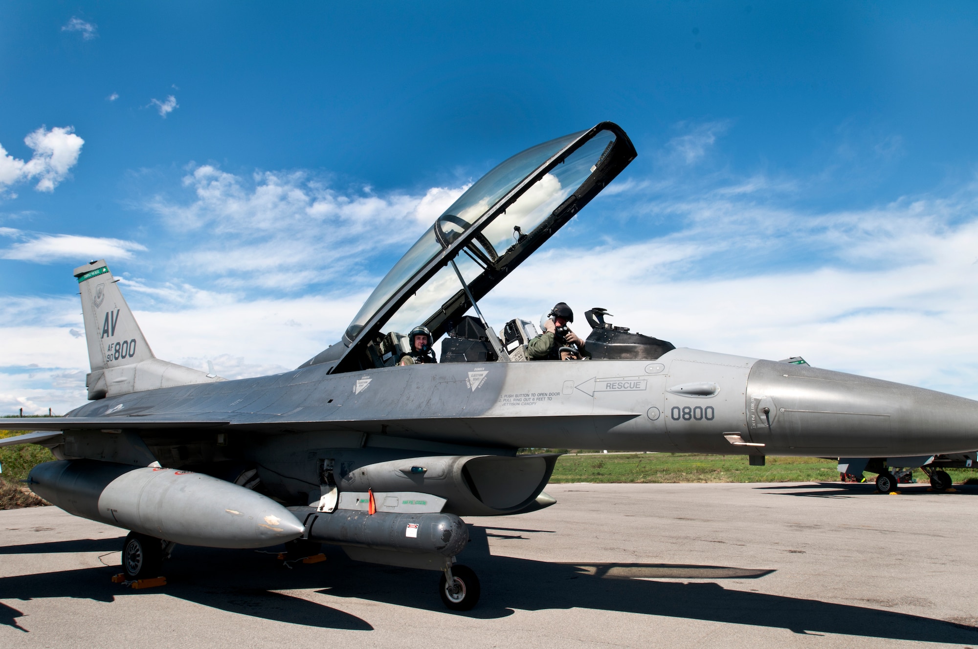 Col. David Walker, 31st Operations Group and Thracian Star 2012 detachment commander, and Capt. Petar Milkov, Bulgarian air force MiG-29 pilot, prepare to fly in an F-16 Fighting Falcon April 19, 2012, at Graf Ignatievo Air Force Base, Bulgaria. More than 500 people are deployed here from the 31st Fighter Wing in support of the month-long coalition training exercise aimed at increasing interoperability between NATO allies. (U.S. Air Force photo/Senior Airman Katherine Windish)
