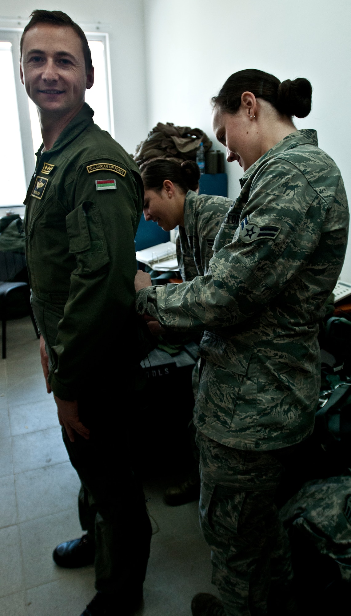 Bulgarian air force MiG-29 pilot, Capt. Petar Milkov, is fitted for life support equipment before his F-16 ride-along flight April 19, 2012, at Graf Ignatievo Air Force Base, Bulgaria. More than two dozen aircraft and 500 Airmen are deployed here from Aviano in support of exercise Thracian Star 2012. Throughout the month-long bilateral training exercise, Aviano F-16 Fighting Falcon pilots are scheduled to spend more than 60 hours per week flying close air support, basic fighter and air combat maneuvers, tactical intercepts, defensive counter air and large force missions with Bulgarian MiG-21 and MiG-29 pilots. (U.S. Air Force photo/Senior Airman Katherine Windish)