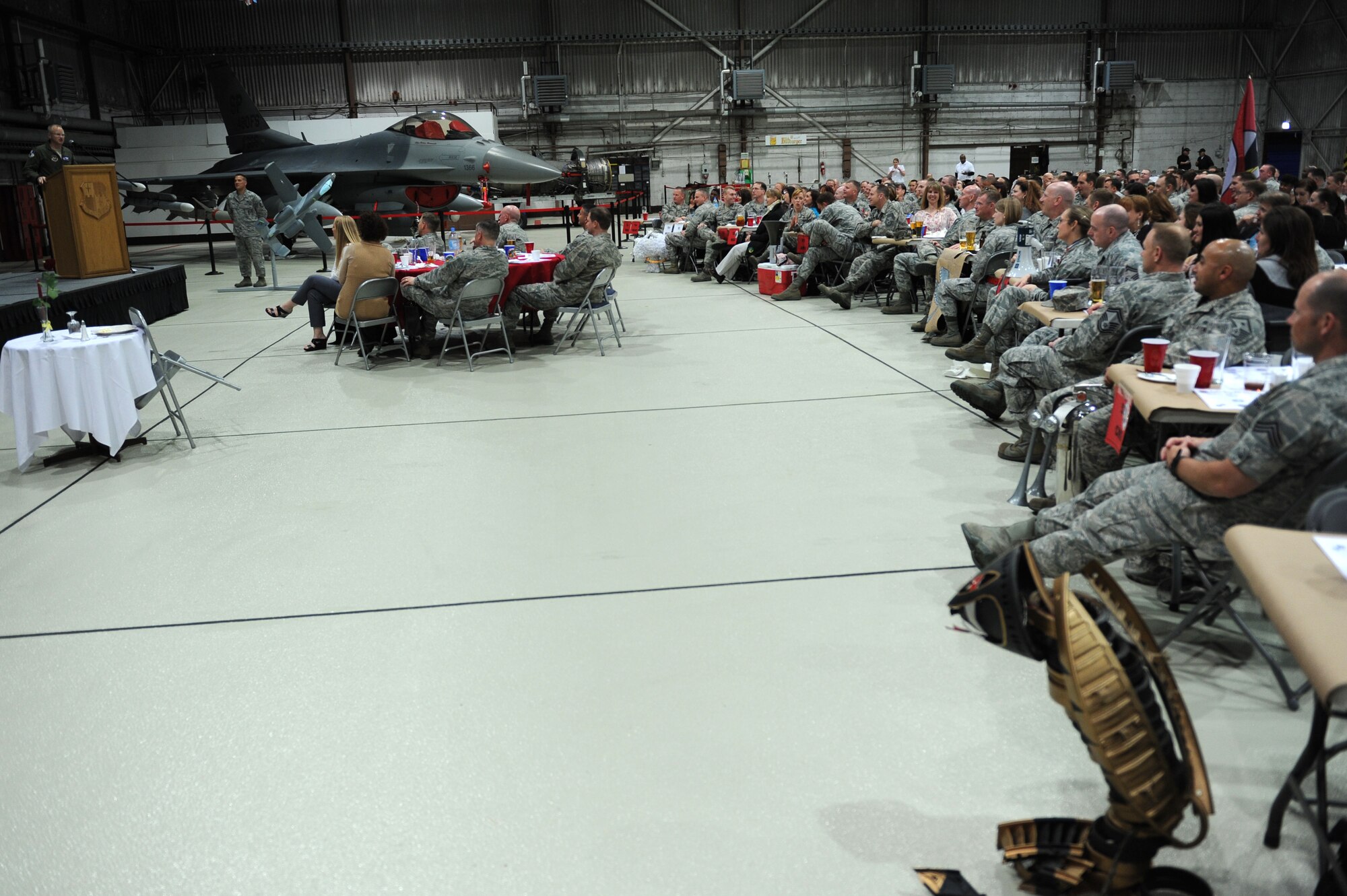 SPANGDAHLEM AIR BASE, Germany – Col. Chris Weggeman, 52nd Fighter Wing commander, speaks during the 2011 Maintenance Professional of the Year banquet at Hangar 1 here April 21. Airmen from the 52nd Maintenance Group and 52nd Munitions Maintenance Group attended the banquet to recognize contributions made by maintenance professionals to mission readiness throughout the year. The banquet also included awards for Airmen and teams who went above and the beyond the established standards for their job performance. (U.S. Air Force photo by Airman 1st Class Matthew B. Fredericks/Released)