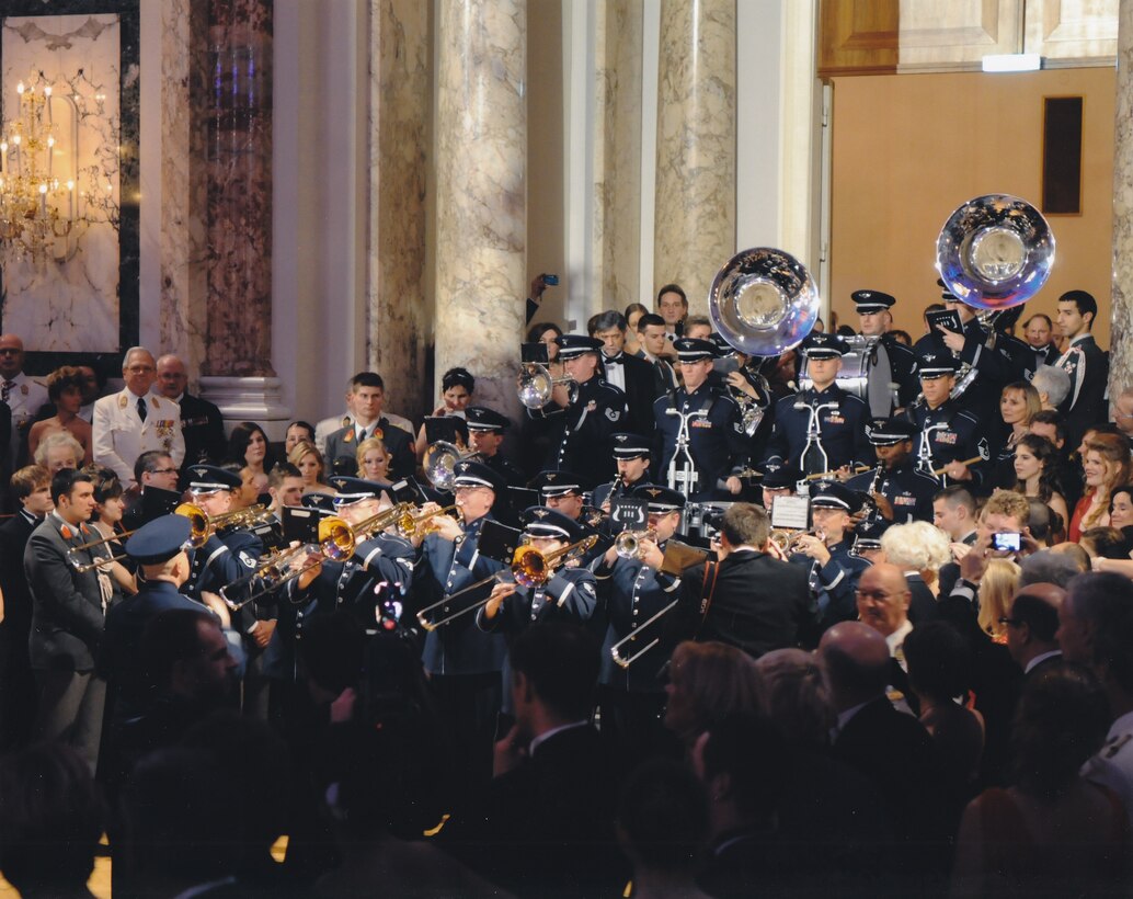 The USAFE Band entertained many at the Military Officers Ball in Vienna, Austria.  The band is pictured entering the main ballroom for a "Battle of the Bands" with Austria's own Guard Band.