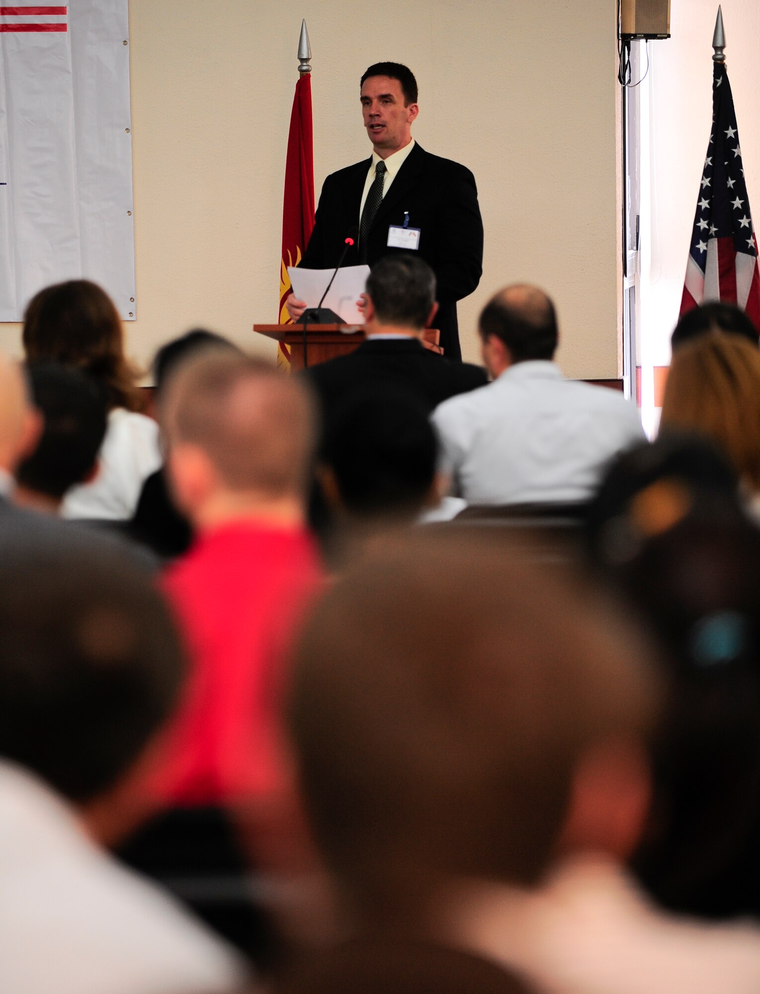 Lt. Col. Mark Graham conducts a briefing on Department of Defense Logistics Agency contracts at the Kyrgyzstan Industry Training Symposium April 24, 2012, in Bishkek, Kyrgyzstan. Graham is the DLA representative for the symposium. DLA's mission statement is to provide the best value integrated logistics solutions to America's Armed forces and other designated customers. (U.S. Air Force photo/Staff Sgt. Angela Ruiz)