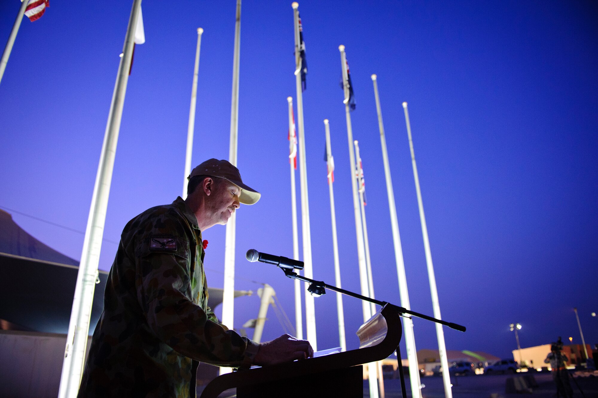 SOUTHWEST ASIA – Royal Australian Air Force Wing Commander Michael Rosenthal talks about the history of Australian and New Zealand Army Corps Day during a ceremony here April 25, 2012. ANZAC Day commemorates those who fought and died during the Gallipoli Campaign in the Ottoman Empire during World War I and also remembers all service members who have fought and died during conflicts throughout each country’s history. (U.S. Air Force photo/Staff Sgt. Nathanael Callon)