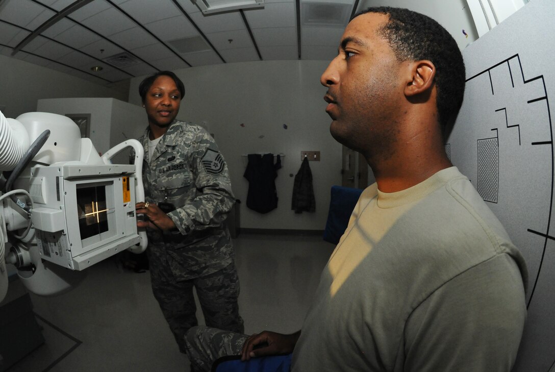 ANDERSEN AIR FORCE BASE, Guam—Master Sgt. Devin Wilson, 36th Medical Group, prepares to take a shoulder x-ray at the medical clinic April 18. The imaging section of the clinic is a walk in appointment style, but the patient has to be referred by a healthcare provider. The clinic also supports outpatient process for military members and their dependants. (U.S. Air Force photo by Senior Airman Benjamin Wiseman/Released)