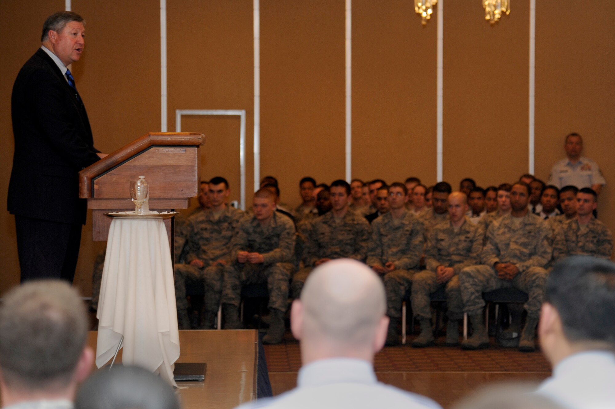 Secretary of the Air Force Michael Donley addresses Airmen at an Airmen's Call during a visit to Misawa Air Base, Japan, April 23, 2012. Donley discussed changes affecting the future of the Air Force. While at Misawa, he met with Airmen and toured various base facilities. (U.S. Air Force photo/Tech. Sgt. Marie Brown/Released)
