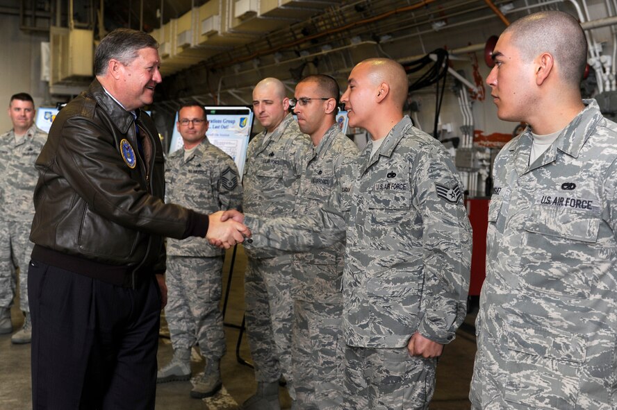 Secretary of the Air Force Michael Donley greets Airmen from the 35th Maintenance Group during a visit to Misawa Air Base, Japan, April 23, 2012. (U.S. Air Force photo by Tech. Sgt. Marie Brown/Released)
