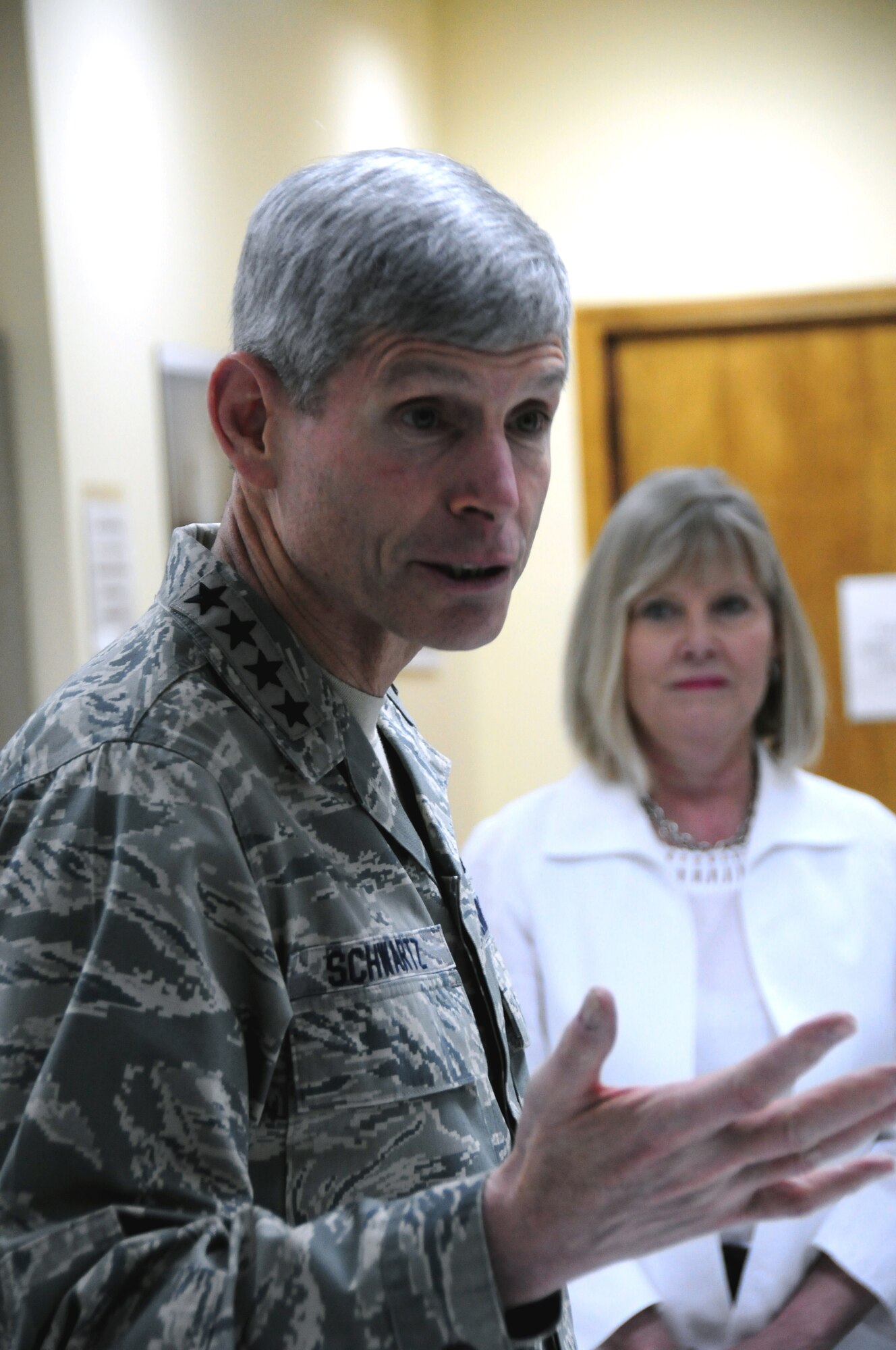 Air Force Chief of Staff Gen. Norton Schwartz and his wife, Suzie, speak to members of the 386th Air Expeditionary Wing, April 21, 2012, at an undisclosed location in Southwest Asia. Schwartz was visiting to meet and speak with deployed members of the 386th Air Expeditionary Wing. (U.S. Air Force photo/Senior Master Sgt. Andrew Lynch)
