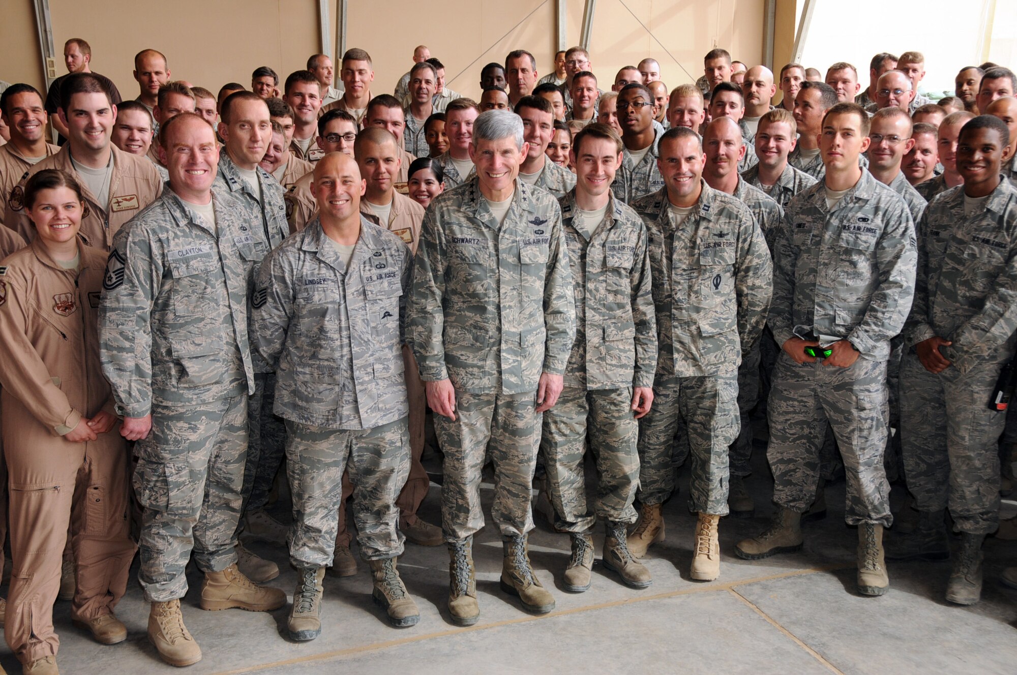 Air Force Chief of Staff Gen. Norton Schwartz stands with members of the 386th Air Expeditionary Wing, April 21, 2012, for a photo opportunity at an undisclosed location in Southwest Asia. Schwartz was visiting to meet and speak with deployed members attached to the 386th Air Expeditionary Wing. (U.S. Air Force photo/Staff Sgt. James Lieth)