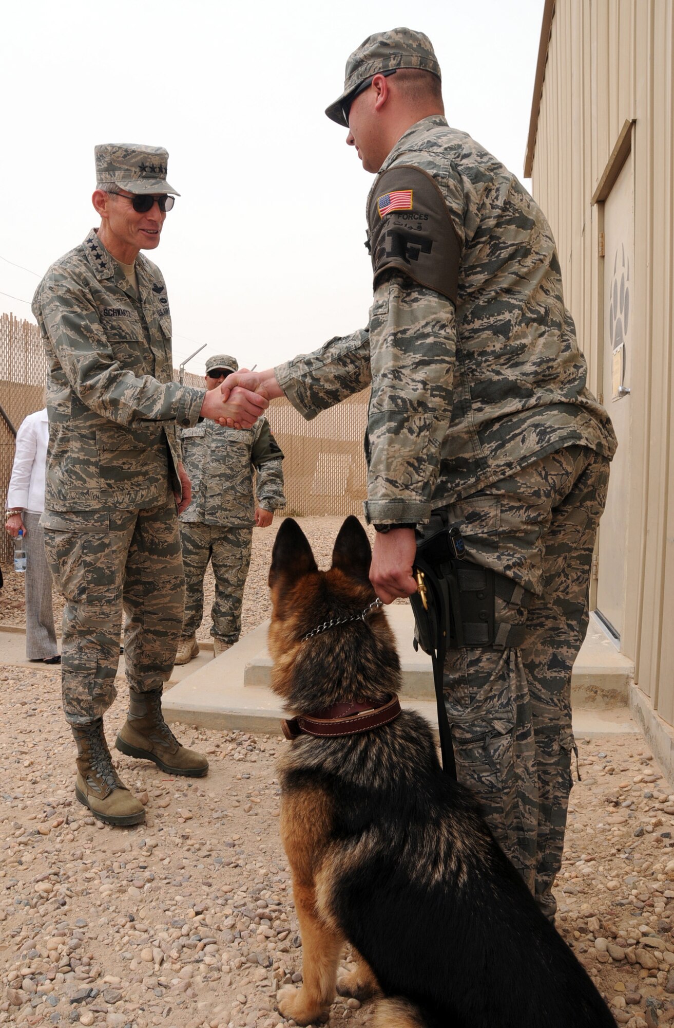 Air Force Chief of Staff Gen. Norton Schwartz shakes hands with a 386th Expeditionary Security Forces Squadron Airman, April 21, 2012, at an undisclosed location in Southwest Asia. Schwartz was visiting to meet and speak with deployed members attached to the 386th Air Expeditionary Wing. (U.S. Air Force photo/Staff Sgt. James Lieth)