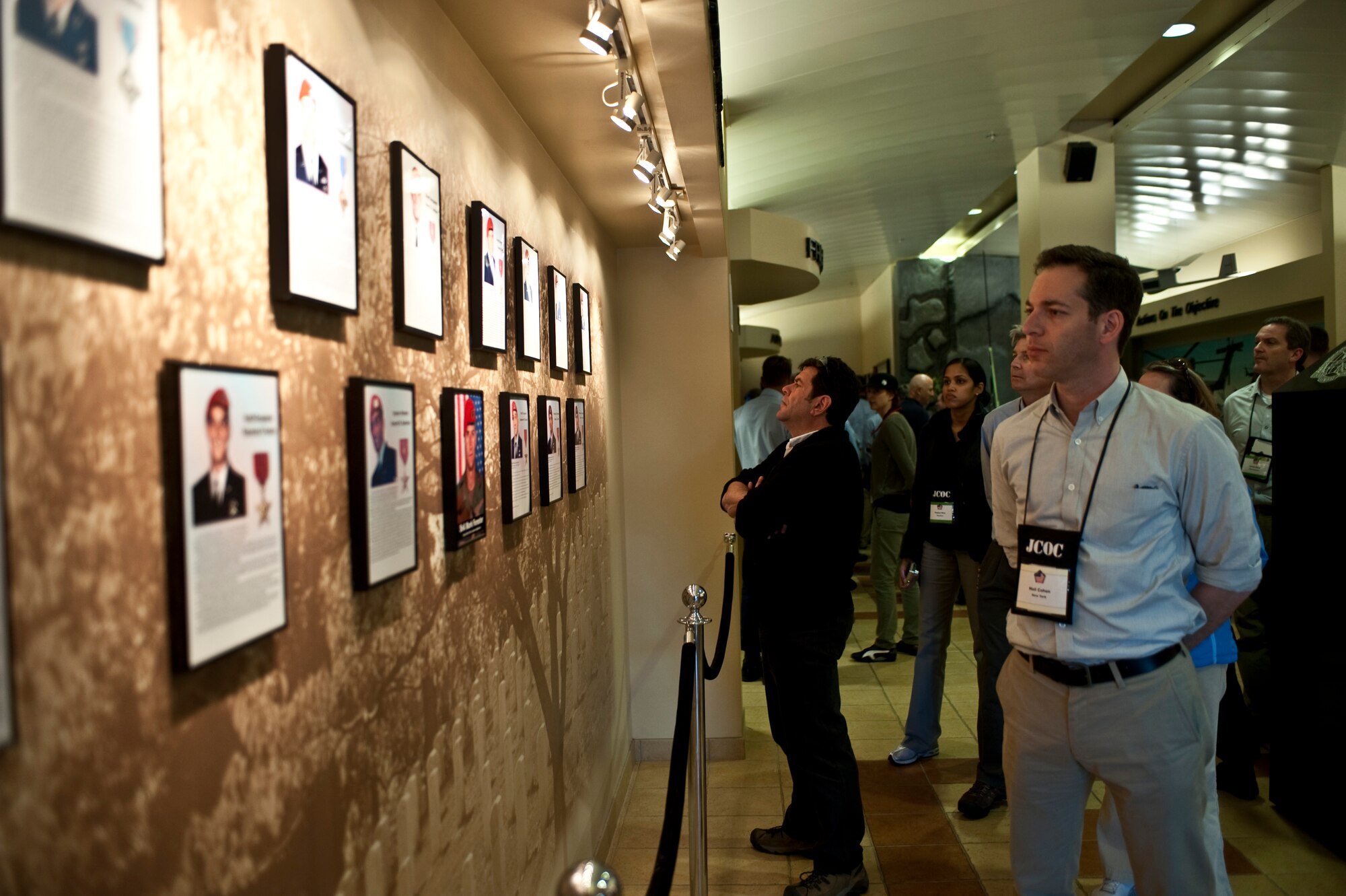 Joint Civilian Orientation Conference attendees view a wall dedicated to fallen Special Tactics Training Squadron graduates at the Special Tactics Training Squadron on Hurlburt Field, Fla., April 24, 2012. The JCOC is the oldest existing Department of Defense outreach program having been held more than 81 times since its inception in 1984. (U.S. Air Force Photo/Airman 1st Class Hayden K. Hyatt)
