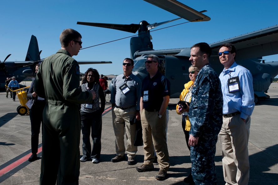 Joint Civilian Orientation Conference attendees are given a briefing in front of a CV-22 from the 8th Special Operations Squadron on the flightline at Hurlburt Field, Fla., April 24, 2012. JCOC attendees toured static aircraft as part of their visit to Hurlburt Field. (U.S. Air Force Photo/Airman 1st Class Hayden K. Hyatt)
